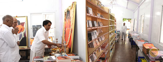 Prasanthi This Week…Facilitating additional service, selling books and audio visual items, a mini Book Stall was opened next to the South Indian Canteen coupon counter, between West 2-3 blocks, on Thursday, 21st June in Prasanthi Nilayam. 