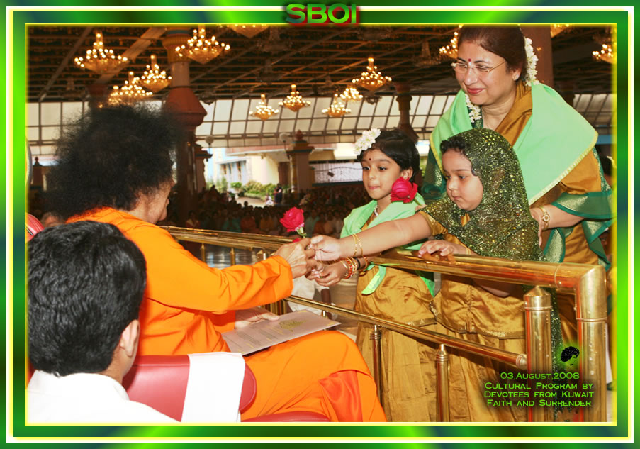 Sai Baba with devotees from Kuwait