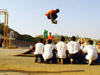 Prasanthi Nilayam Campus students performing ramp jumps on roller skates